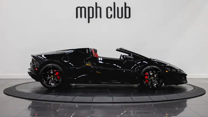 Black on red Lamborghini Huracan Spyder rental side view - mph club