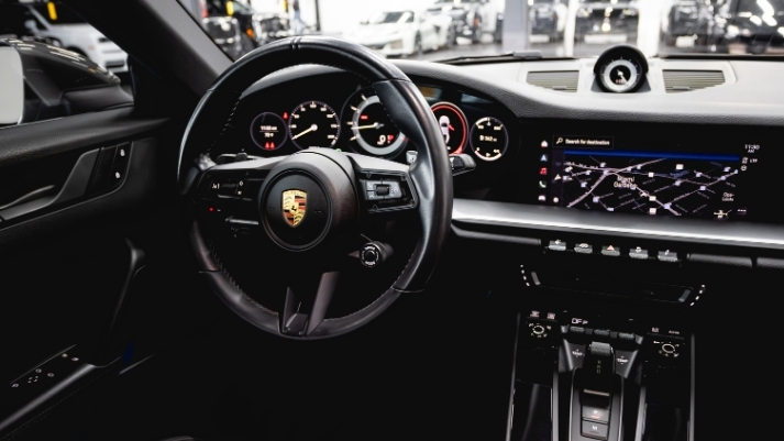 Silver Porsche 911 Carrera T rental dashboard view - mph club
