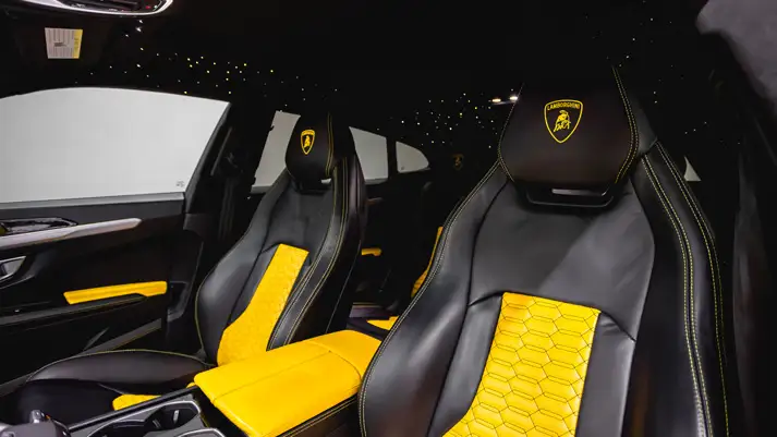 Yellow Lamborghini Urus with stars rental interior view - mph club