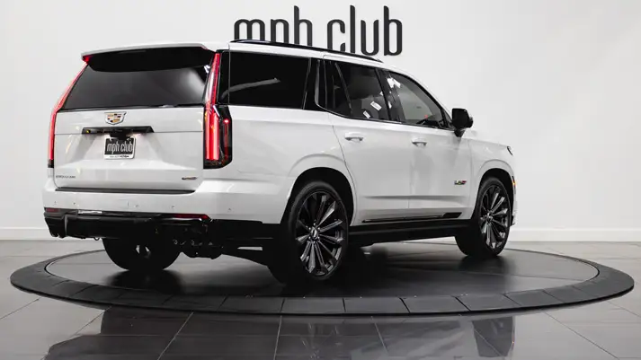 White Cadillac Escalade V for rent rear view - mph club