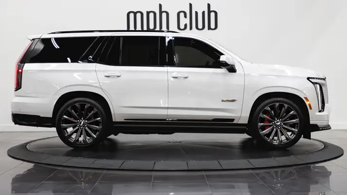 White Cadillac Escalade V for rent side view - mph club