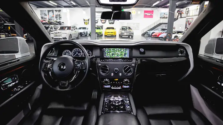 White on black Rolls Royce Cullinan rental dashboard view - mph club