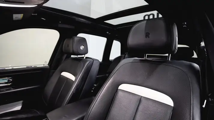 White on black Rolls Royce Cullinan rental interior view - mph club