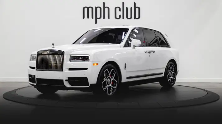 White on black Rolls Royce Cullinan rental profile view rszd - mph club