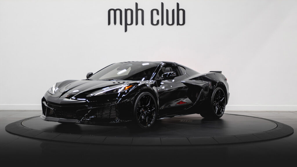 Black on black Chevrolet Corvette Z06 rental profile view - mph club