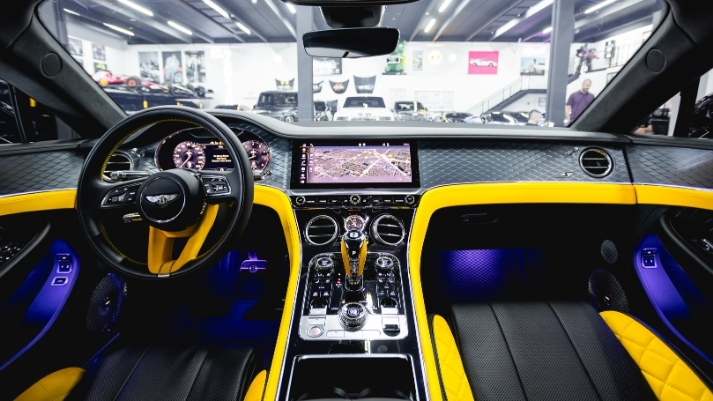 Silver Bentley GT rental dashboard view - mph club
