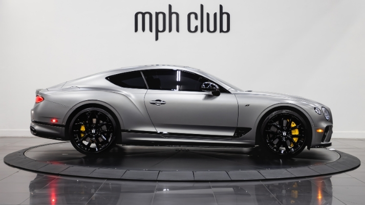 Silver Bentley GT rental side view - mph club